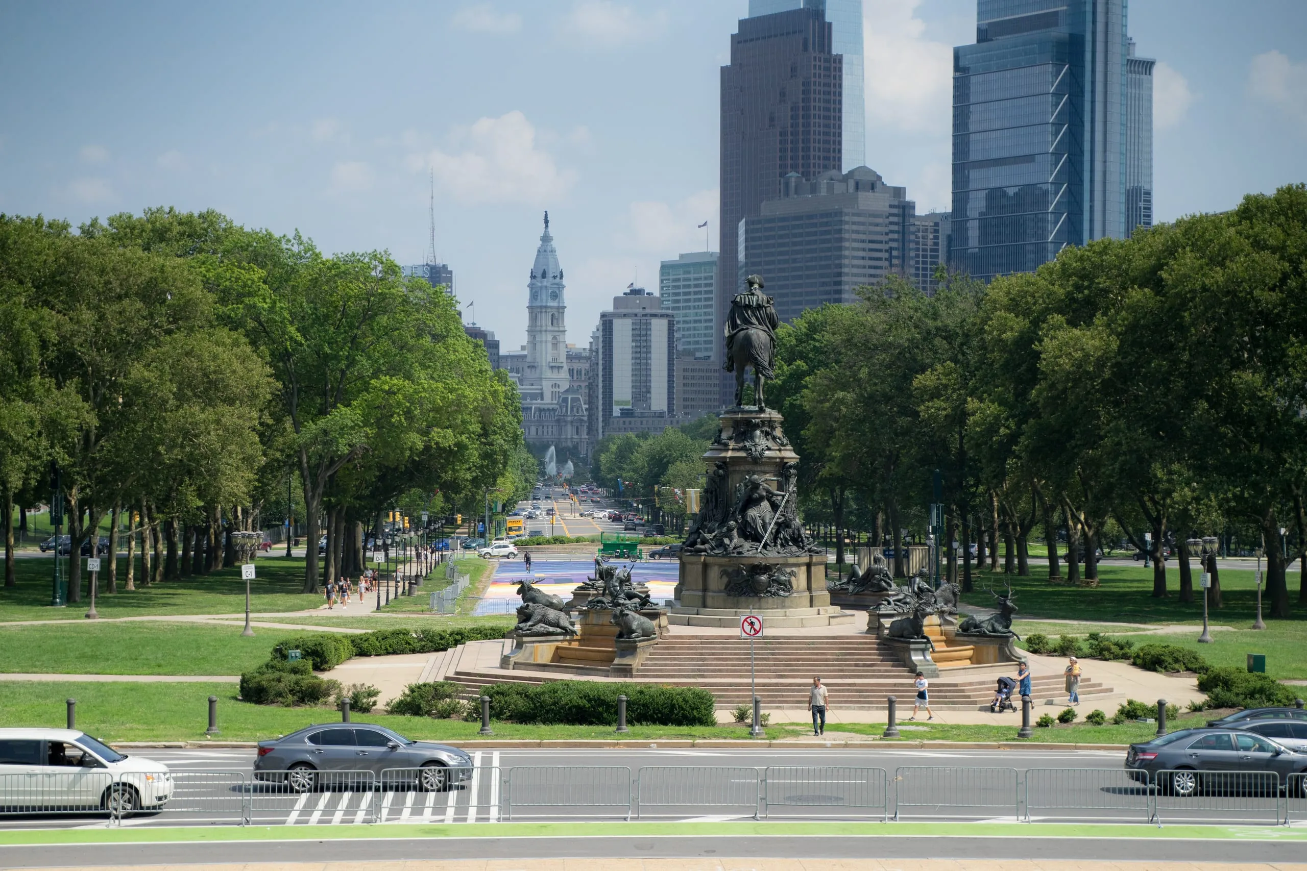 Benjamin Franklin Parkway running straight to Philadelphia City Hall past the Eakins Oval fountain