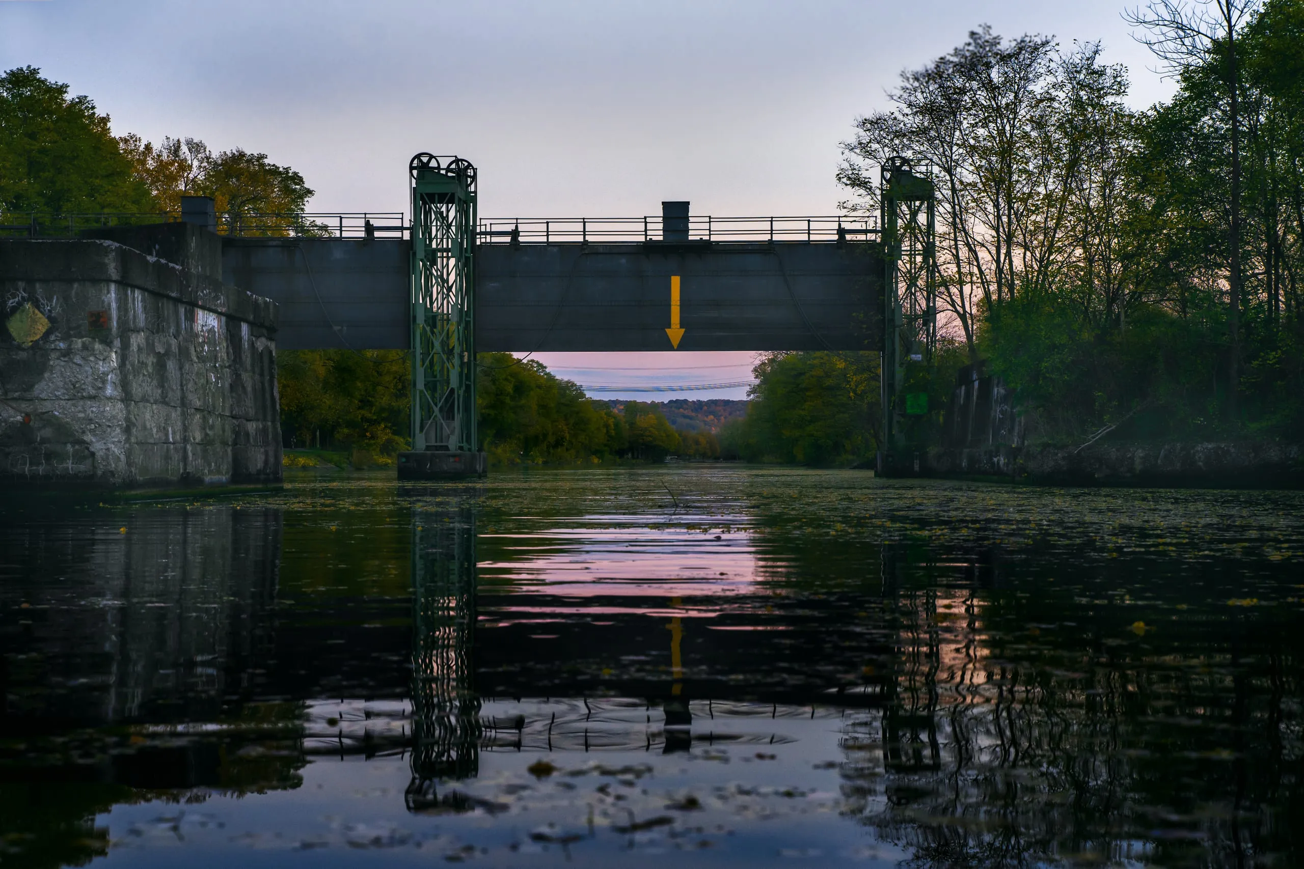 Historic Erie Canal guard lock gates at dusk near Rochester, New York