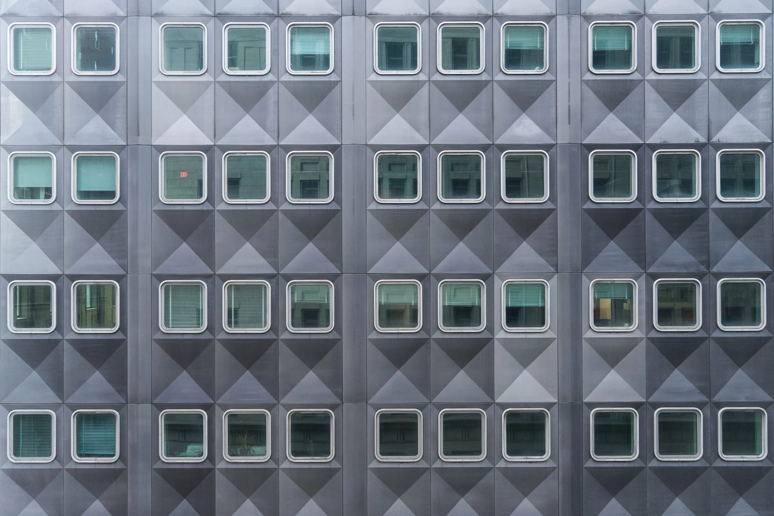 Repeating concrete facade pattern on a Pittsburgh building
