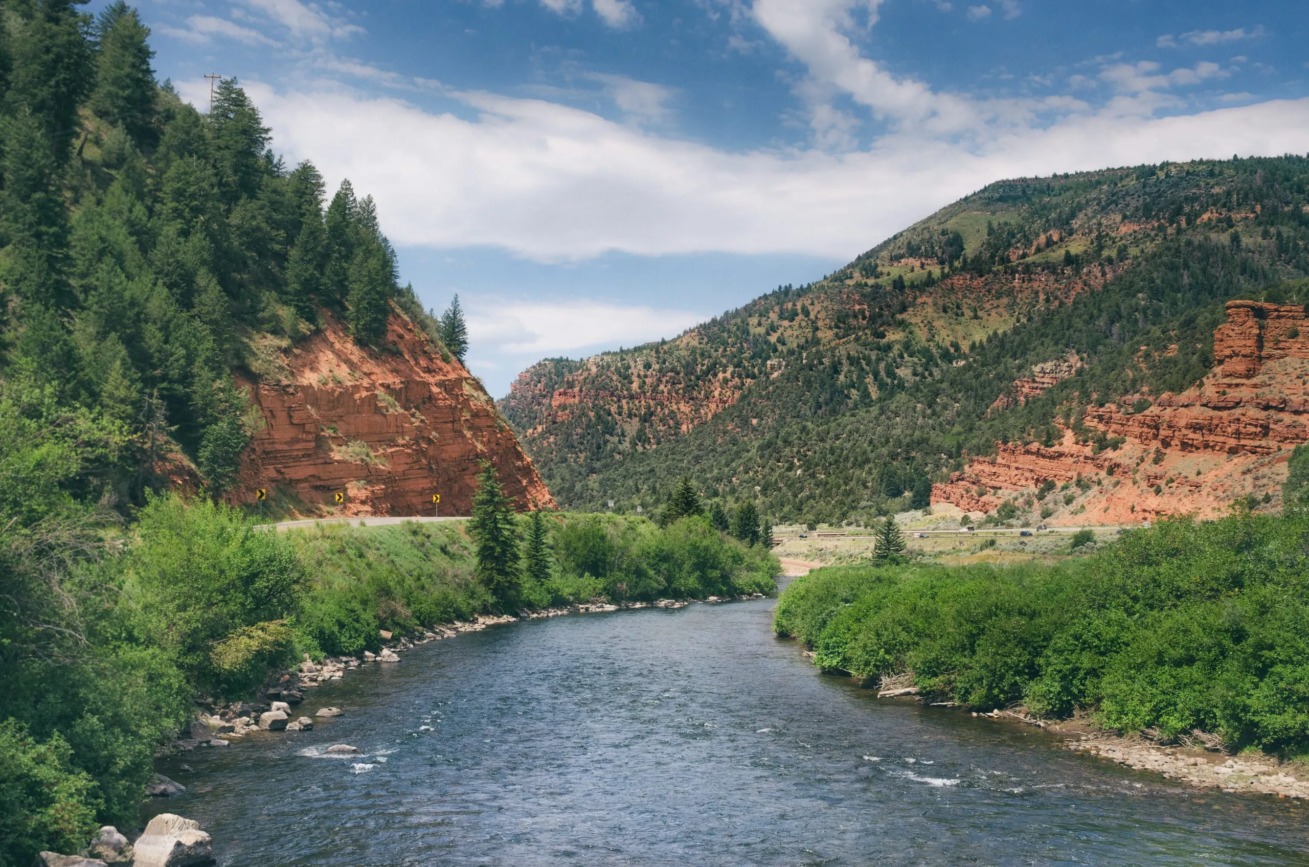 River bending through a red rock canyon in Colorado